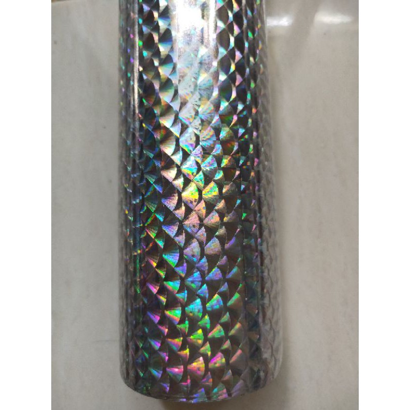 

Stiker Hologram 3D Motif Sisik Ikan Ukuran 10cm x 60cm