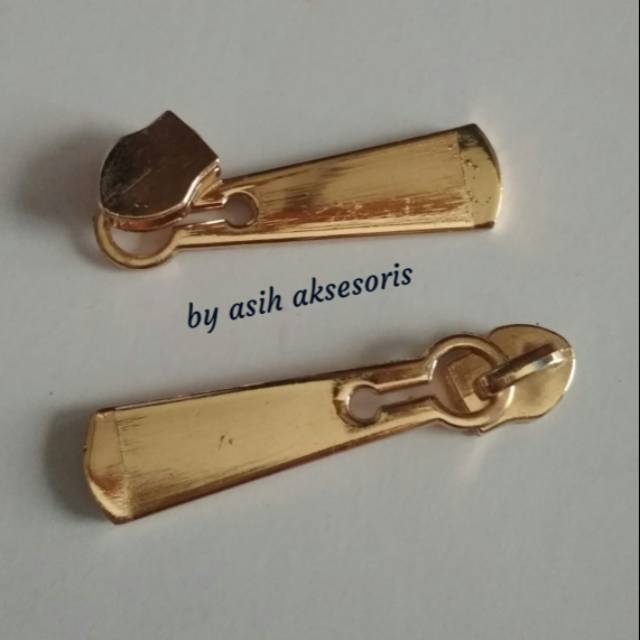 Kepala resleting no.5 plastik mas muda/101