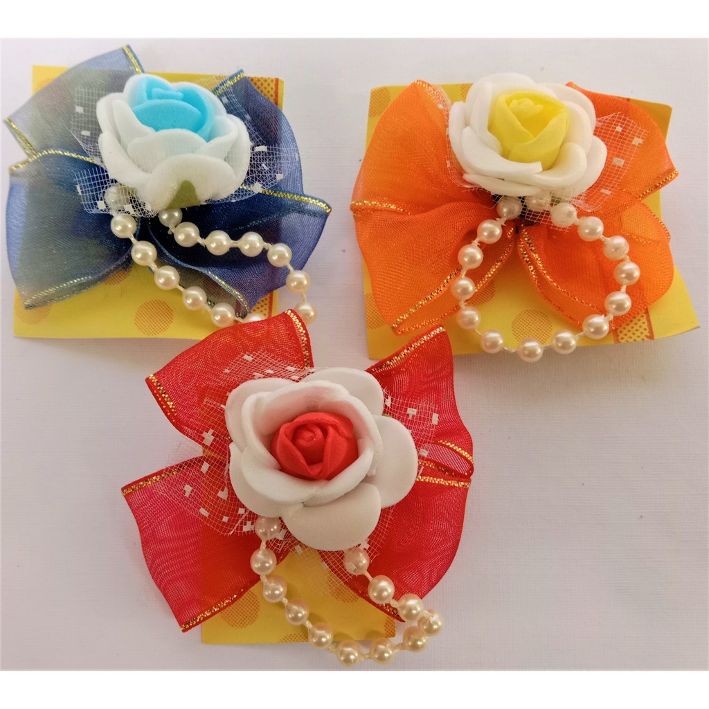 Bross Bunga Pita Kain