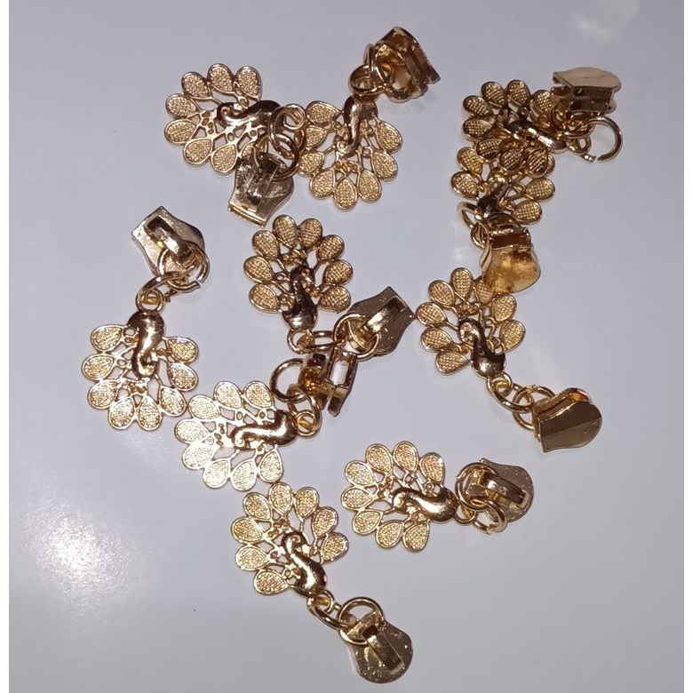 Kepala Resleting besi Merak