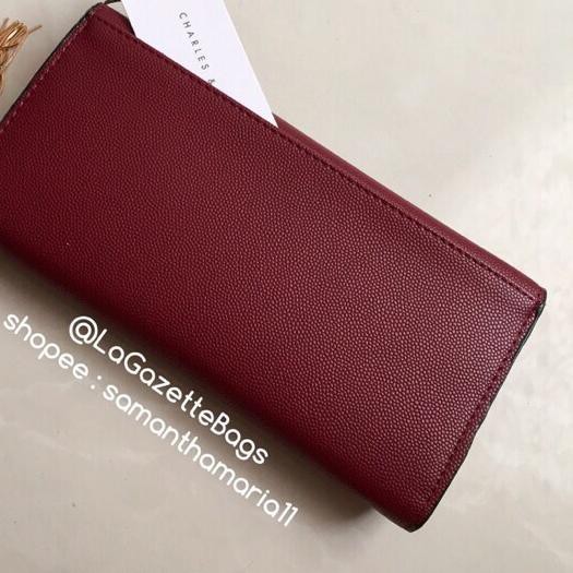 ♞ Dompet cnk charles and & keith ori original murah ck wallet tassel maroon ❂