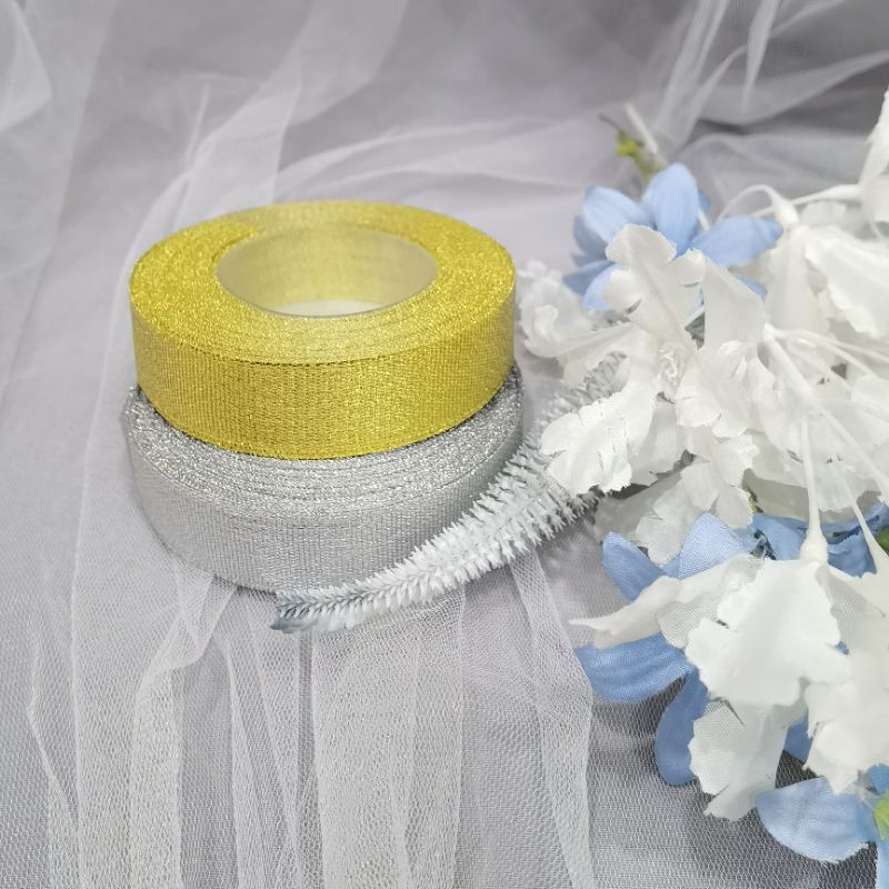 

Pita Glitter Gold & Silver ±30 yard / Pita Hampers / Pita Money Cake