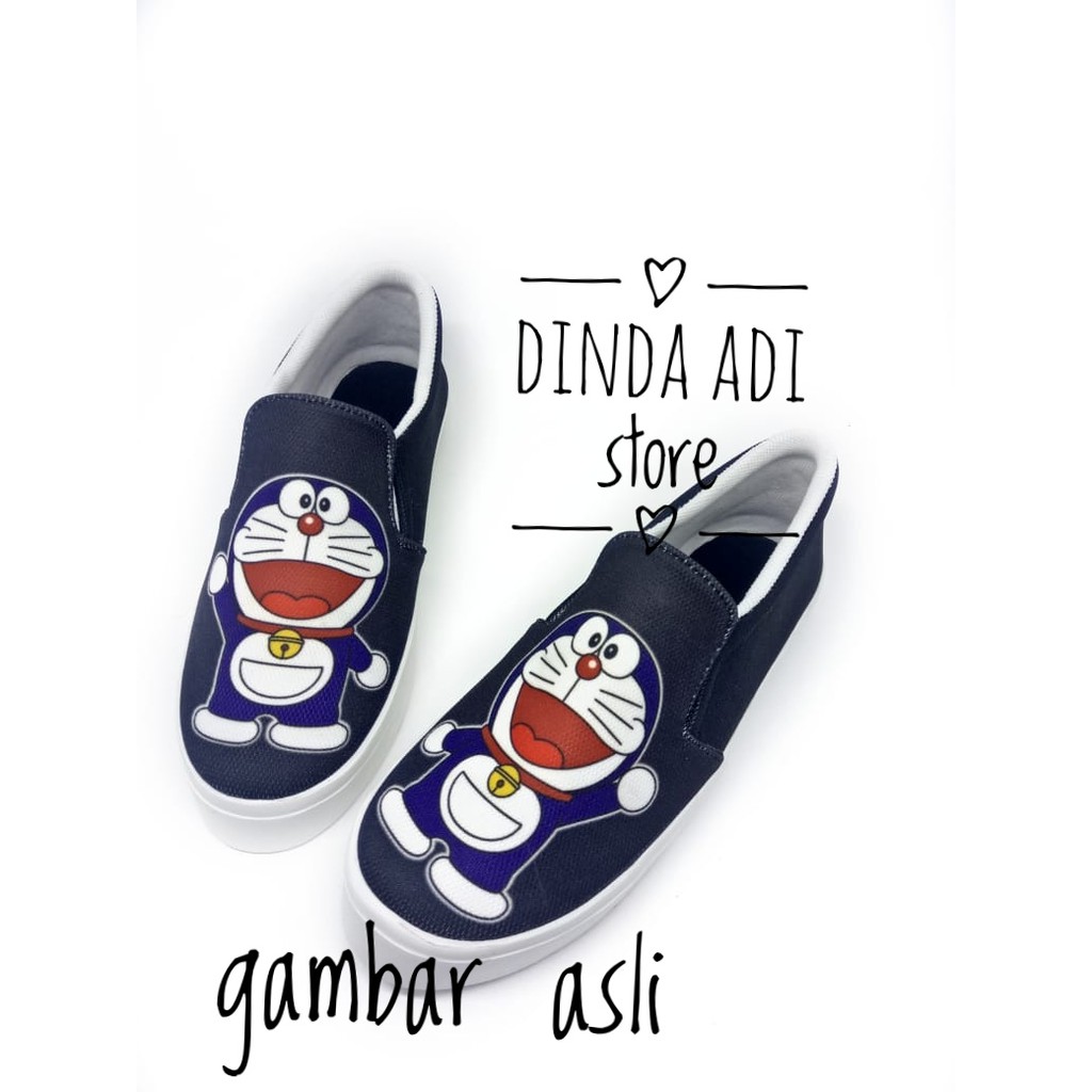 DINDA SEPATU WANITA SLIP ON DORAEMON REALPICT 100% MURAH - BIRU DAN HITAM