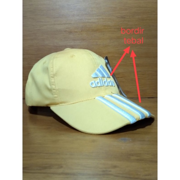 topi pet adidas