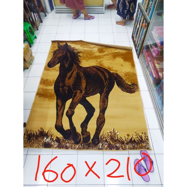 Karpet permadani motif hewan