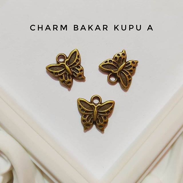 Charm bakar kupu A