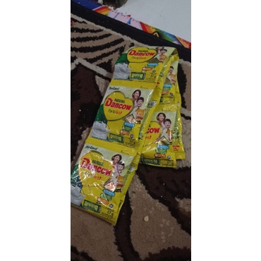 

Nestle Dancow Putih dan Cokelat Sachet 1 Renteng 10 × 27g