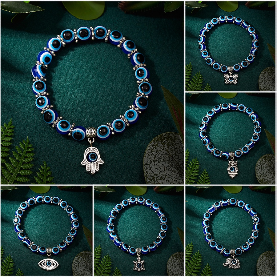 Gelang Tangan Elastis Desain Hewan Gajah / Kupu-Kupu / Mata Iblis Hollow 8mm Untuk Pria / Wanita