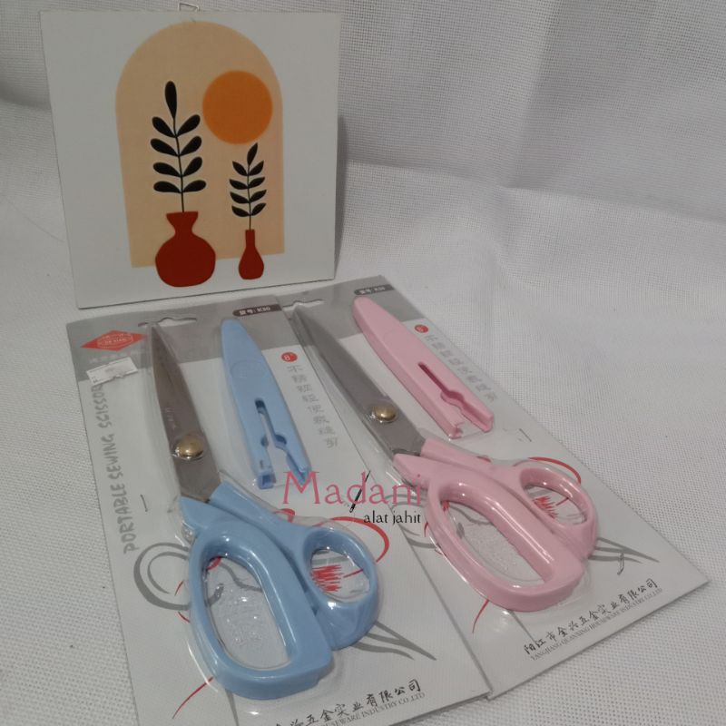 

Gunting Kain merk De Xian