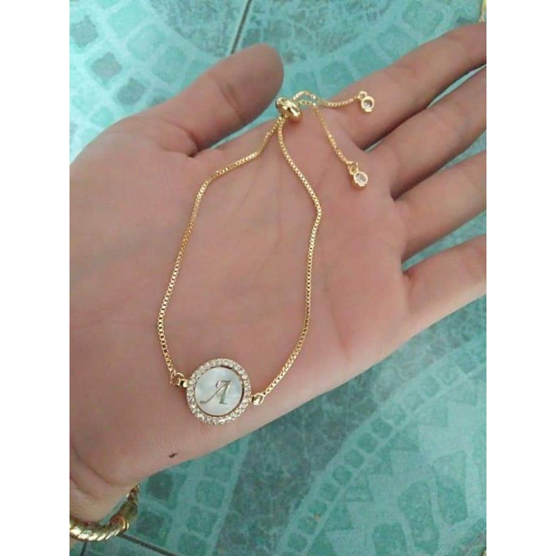 Gelang HURUF titanium lapis emas asli