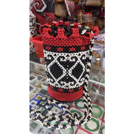 Tas anjat manik selempang