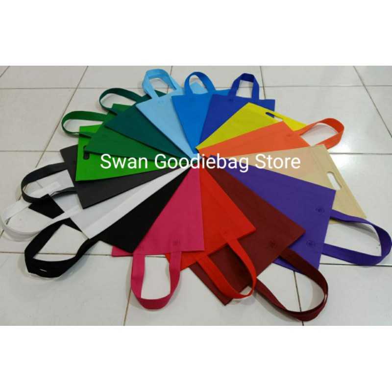 

(LUSINAN 12 PCS) Goodie bag handle lipat samping 25x35x8 tas promosi/ tas souvenir/ tas spunbond