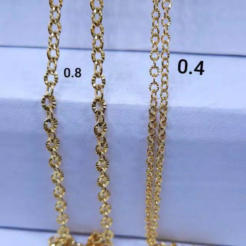 KALUNG TITANIUM WARNA EMAS MODEL NURI MOTIF PRIA WANITA