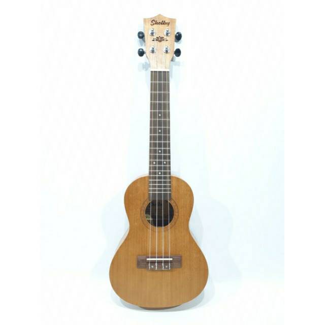 Ukulele Concerto Merk Shelby Tipe SU-23 M STNT Original Ukuran 23 Inc Warna Coklat Tua Ukir Murah