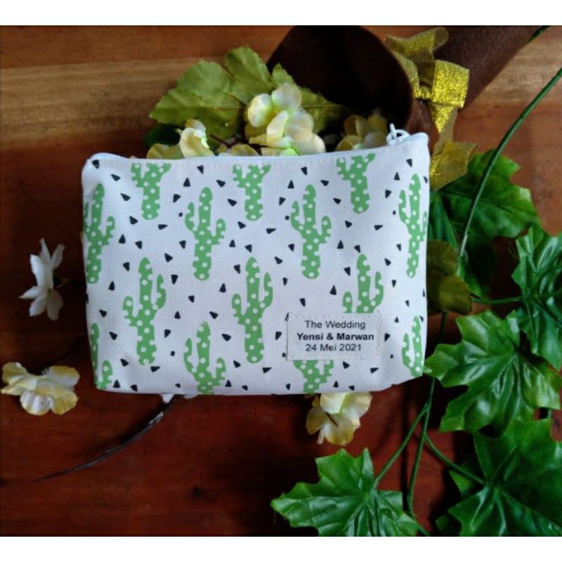 

souvenir pouch plus label nama