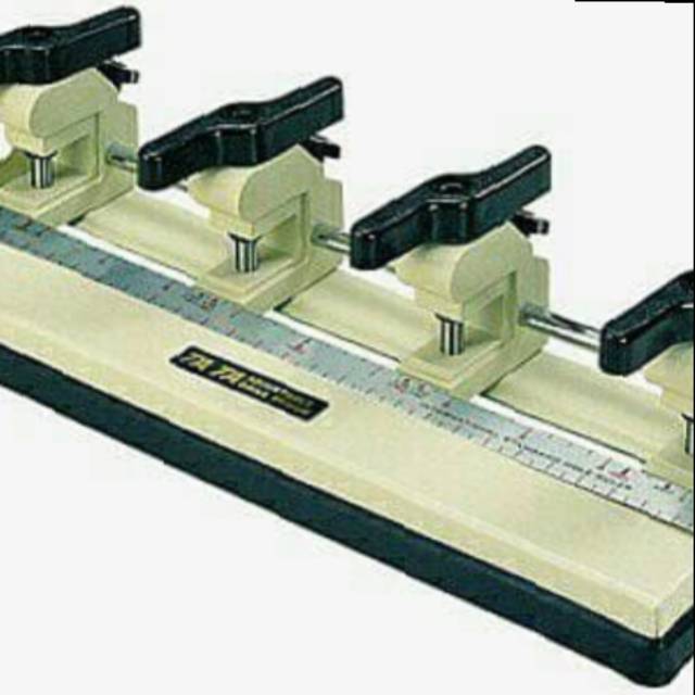 

Drill Punch TATA P4 4 Lubang 4 Hole Pembolong Kertas