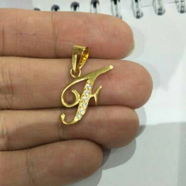 Liontin emas asli kadar 700 huruf F