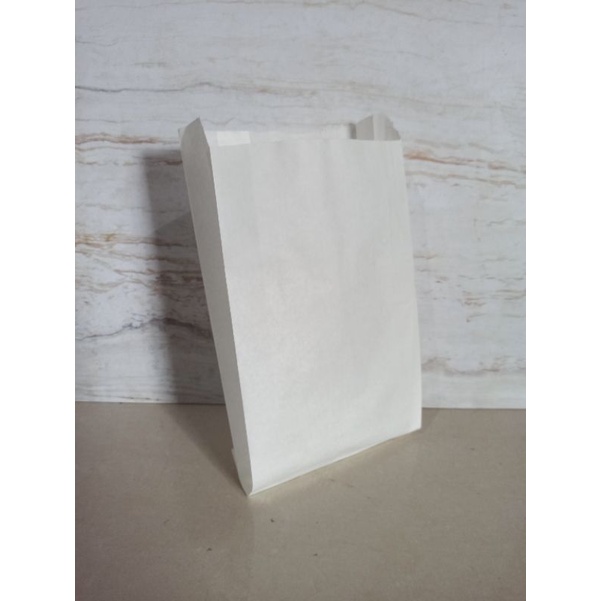 

Paper bag kantong kertas greaseproof tahan minyak putih uk 19x11x3 cm (kantong donat)( min.pembelian 50 pcs)