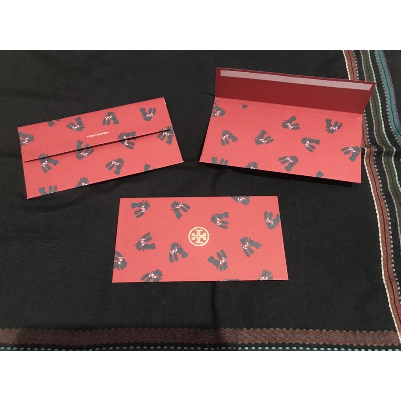 

Tory Burch envelopes