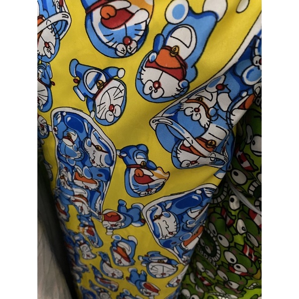Kain katun / kain meteran motif karakter doraemon murah