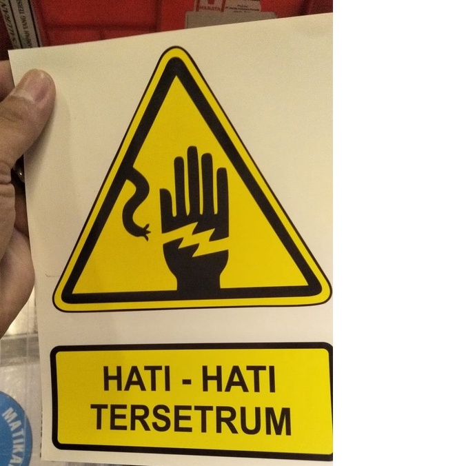 

sticker hati-hati tersetrum uk 20x15cm kuning