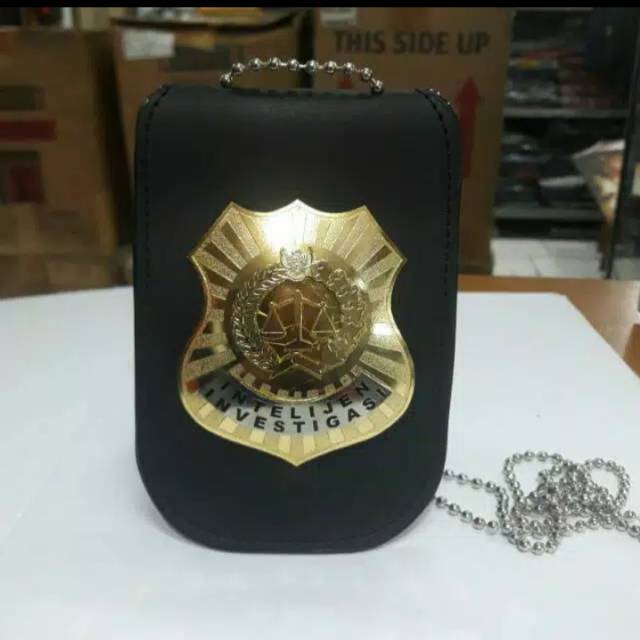 Lencana/KTA investigasi