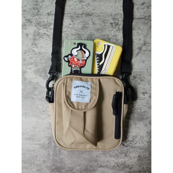 Sling bag by freasltd model carhartt warna cream