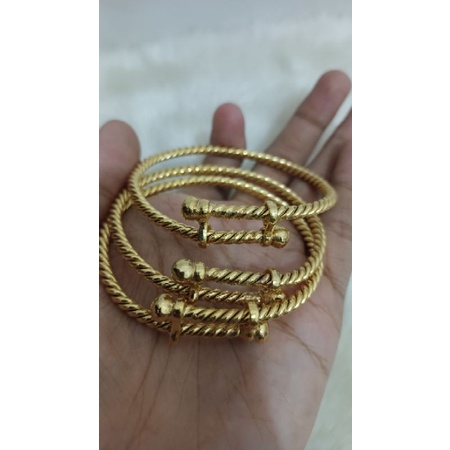 Gelang lilit tinju kunci lapis emas