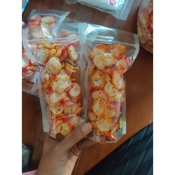 

KERUPUK SEBLAK KENCUR KEMASAN 45GRAM