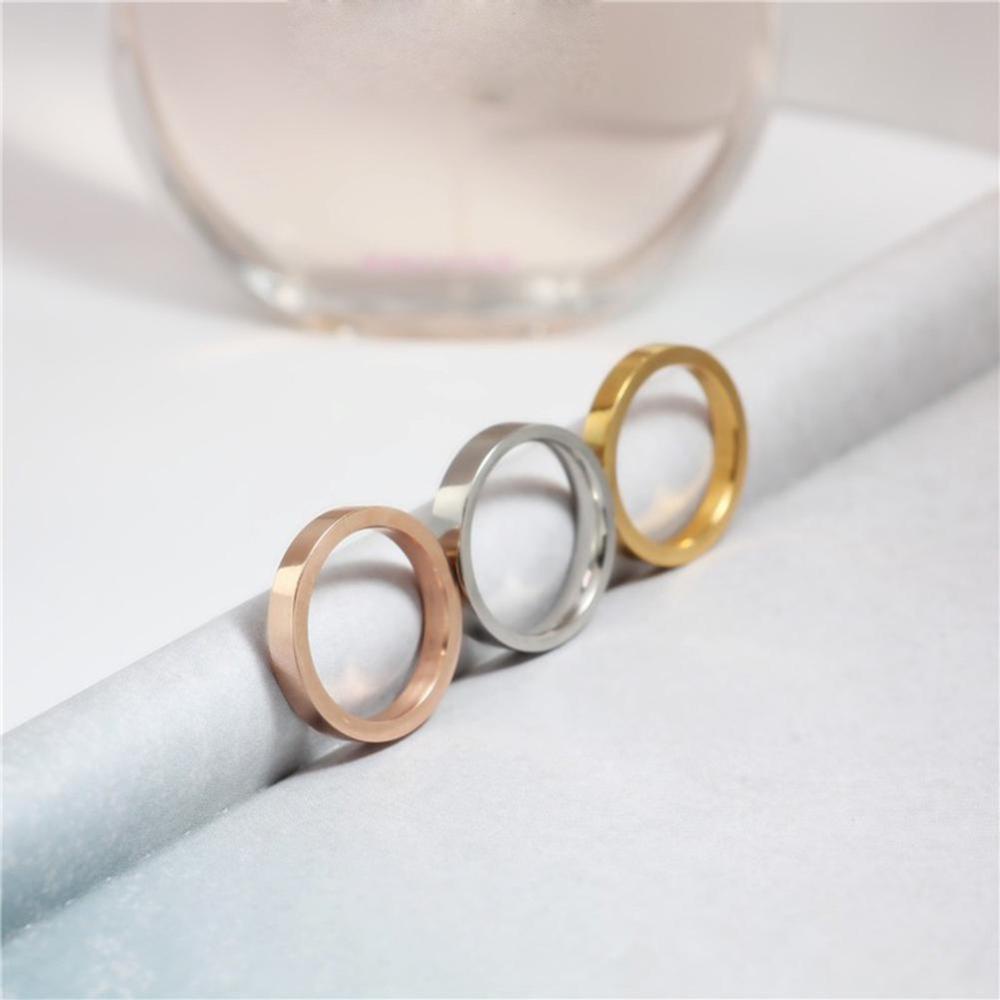 Cincin Bahan Titanium Steel Ukuran 3mm Warna Silver / Gold / Rose Gold / Hitam A4K8 Untuk Pria / Wanita