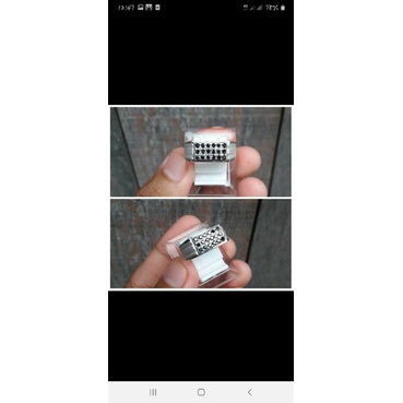 cincin perak berlian hitam.