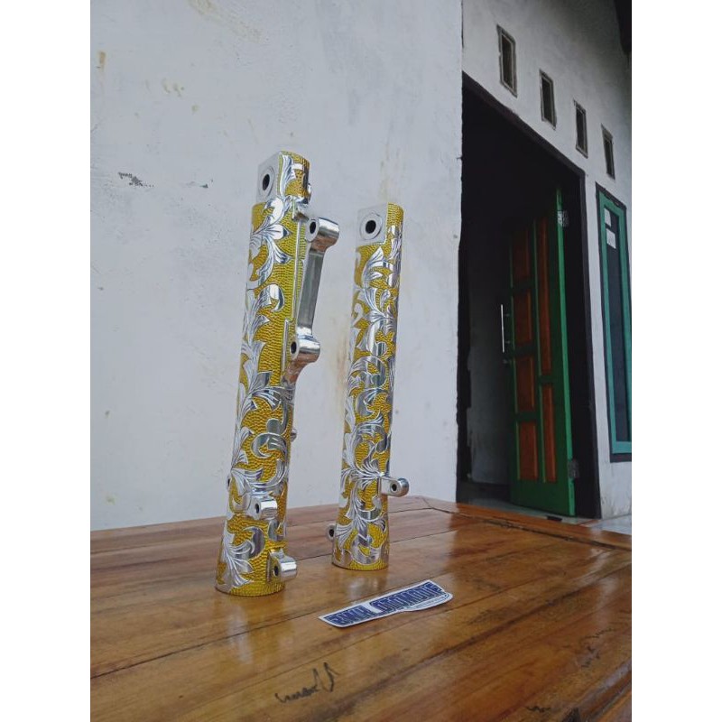 Bottom shock depan tiger ukir candy