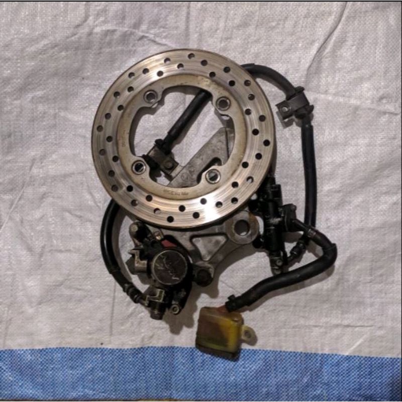 Rem Belakang Tiger Revo set piringan original