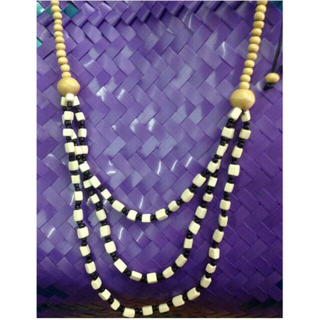 

Kalung bali tulang kotak susun 3