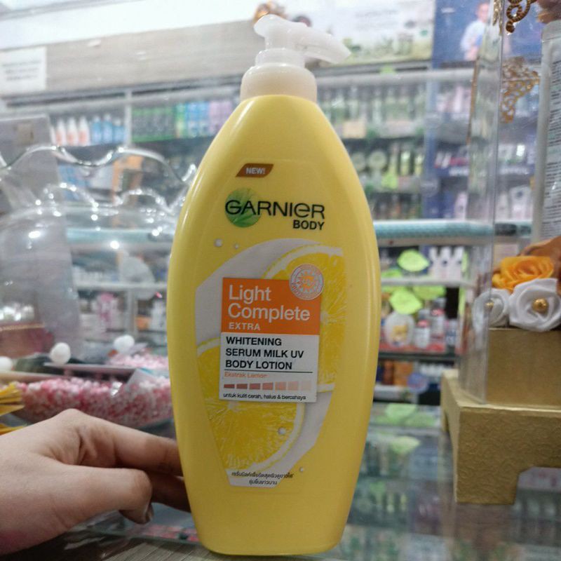 Jual Garnier body light complete extra whitening serum milk uv body