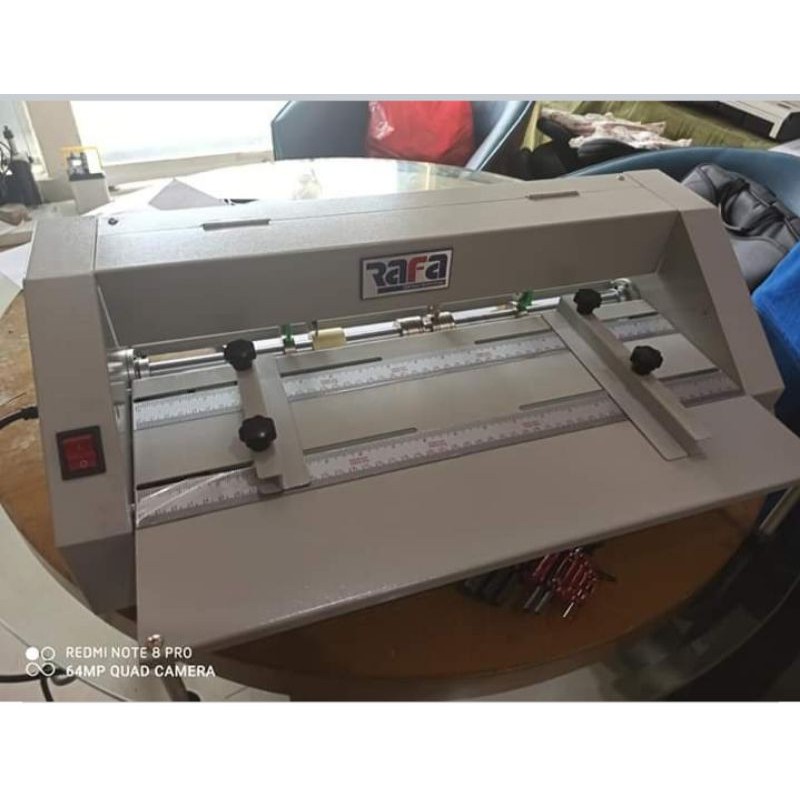 Mesin rel dan porporasi otomatis merk Rafa