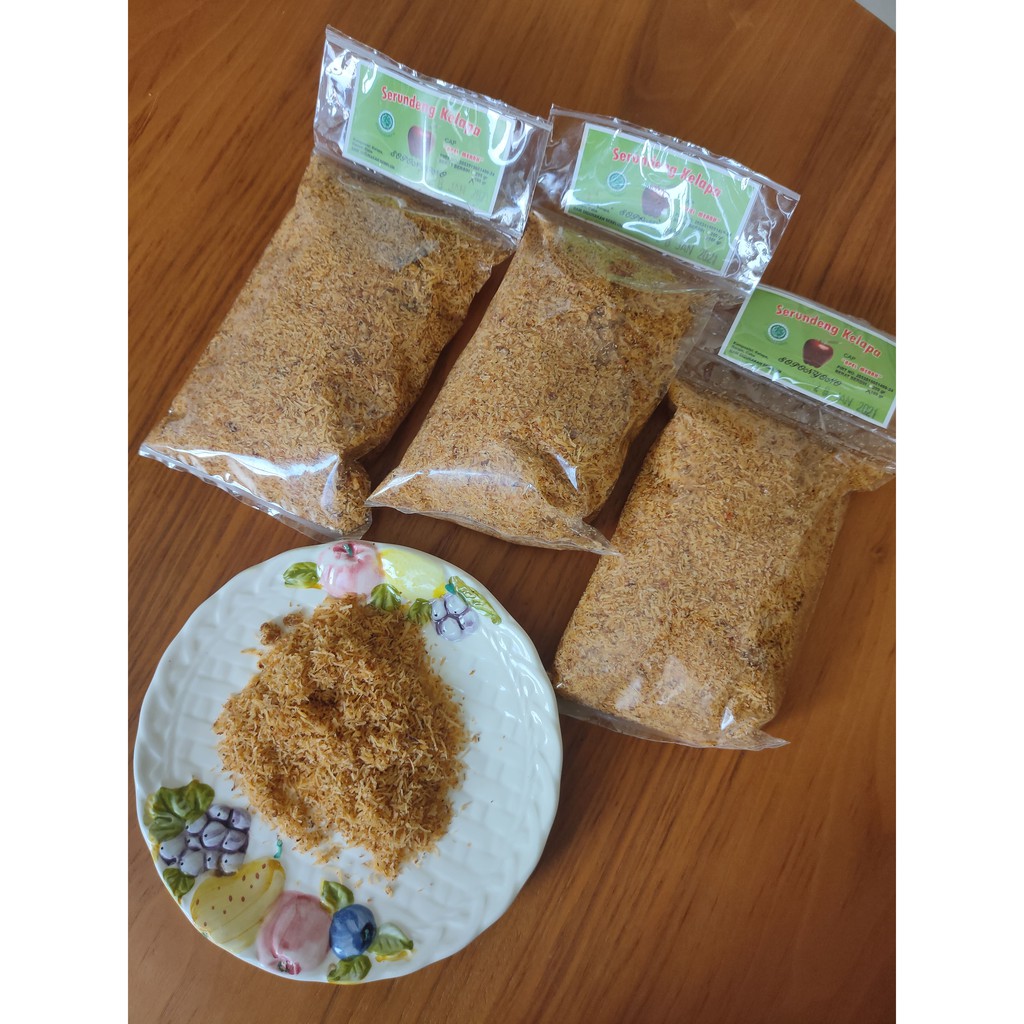 

SERUNDENG KELAPA CAP APEL MERAH SOPONYONO 100 GR/SERUNDENG KELAPA SOPONYONO/SRUNDENG KELAPA SRUNDENG