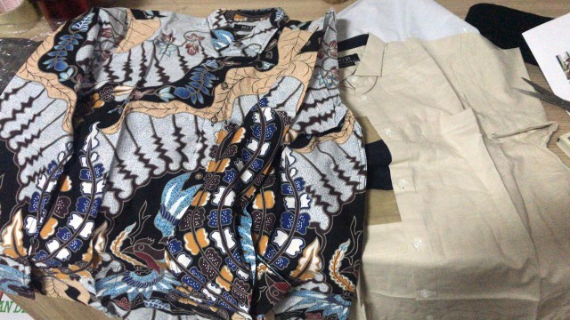 M231 Kemeja Pria Batik Panjang Orange 1725a