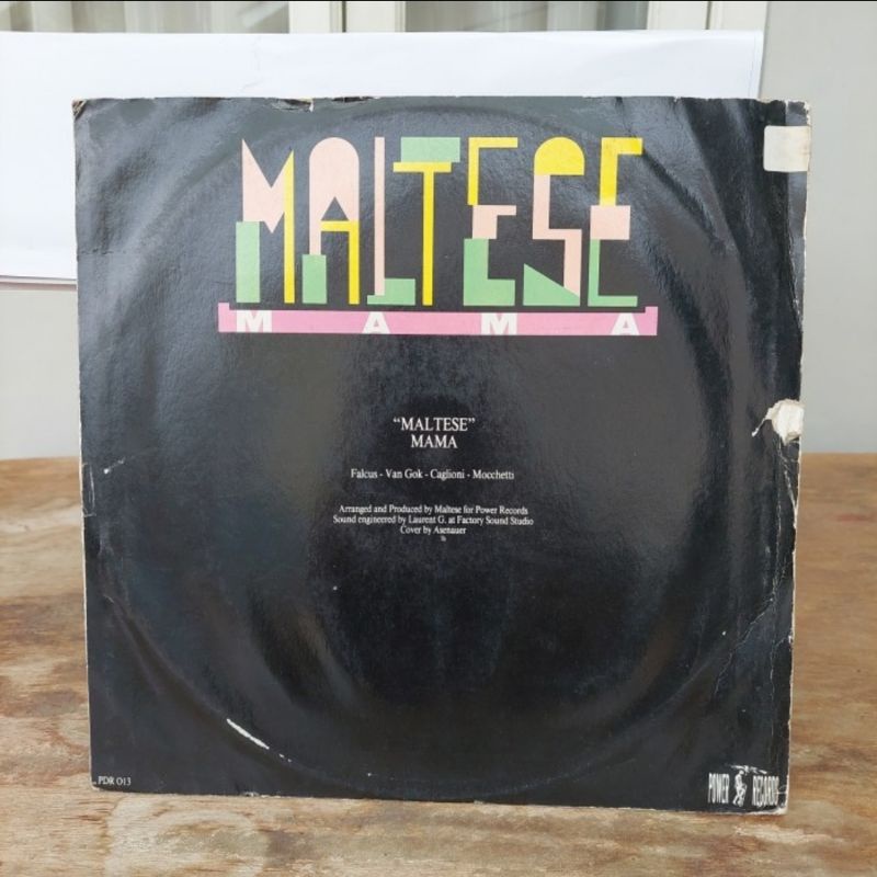 Kaset Vinyl Piringan Hitam Maltese