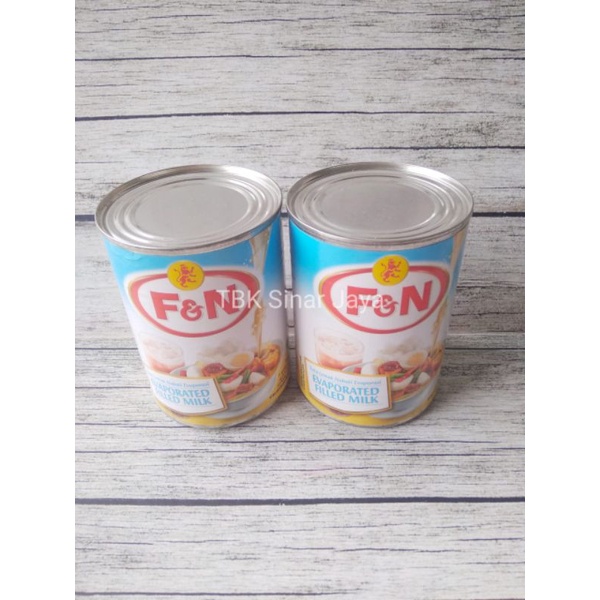 

susu evaporasi f &n kemesan kaleng 300 gram susu cair fn evaporated untuk topping Thai the murah