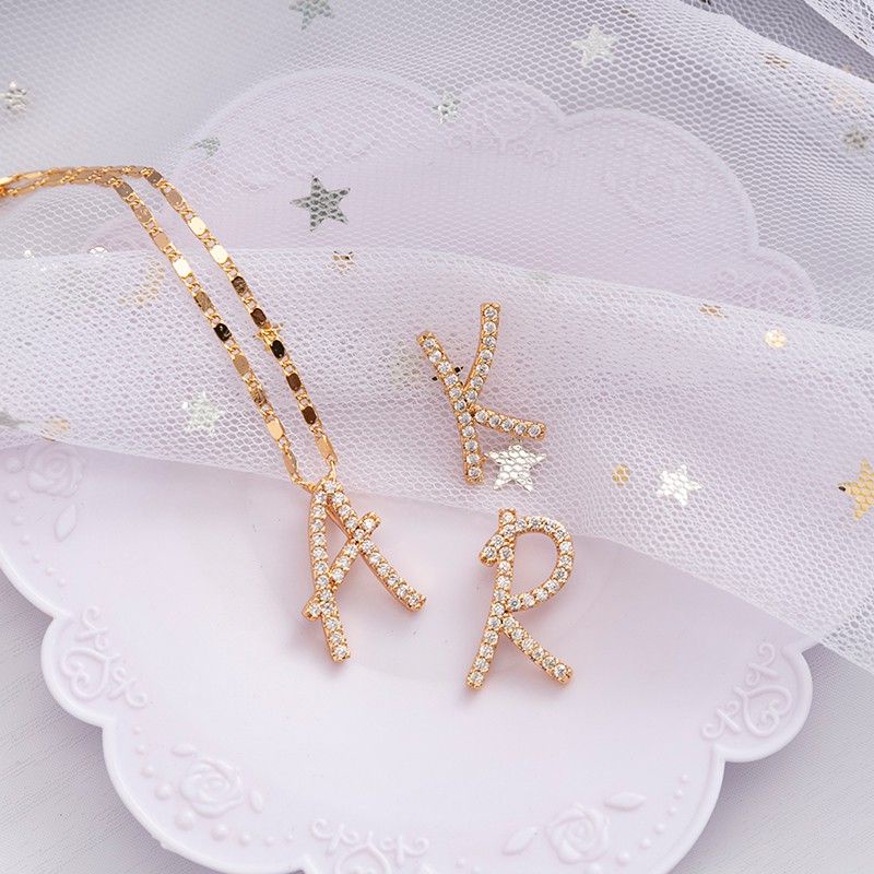 kalung titanium lapis emas model huruf abjad A-Z