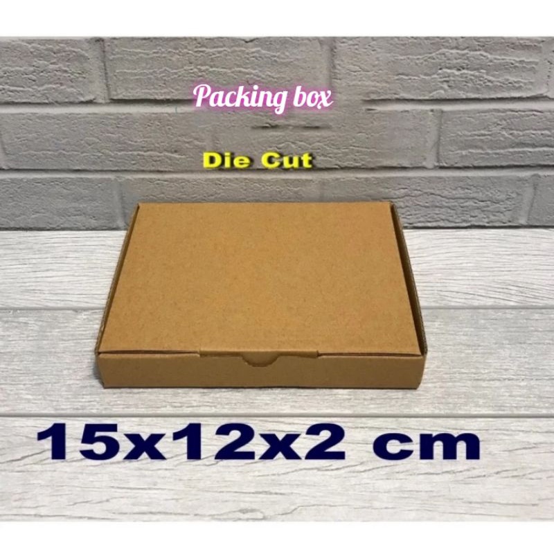 

Kardus uk.15x12x2 cm box/karton die cut untuk packing dll