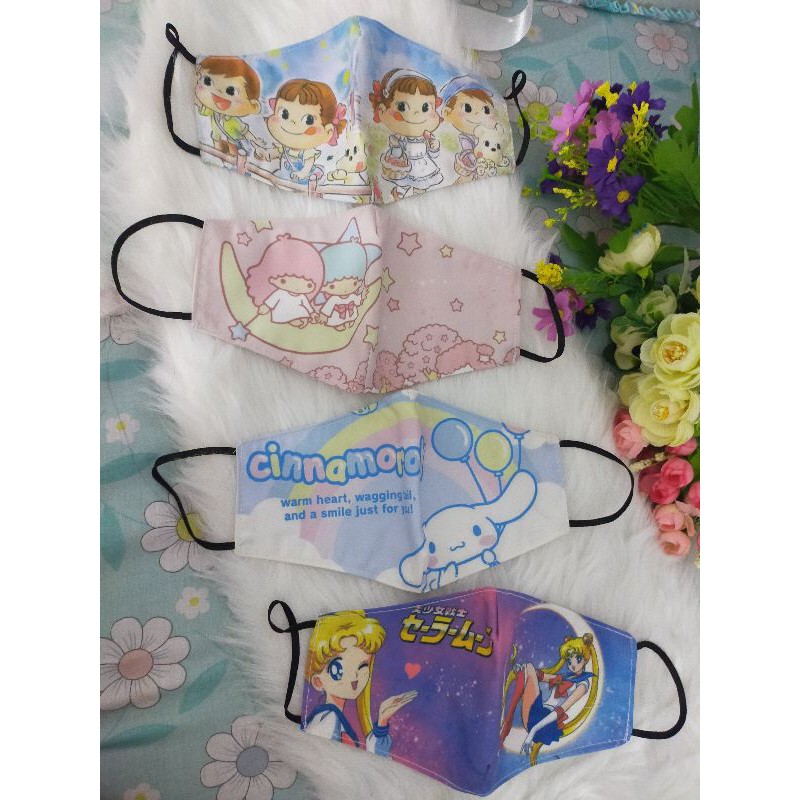 Masker kain printing motif kartun