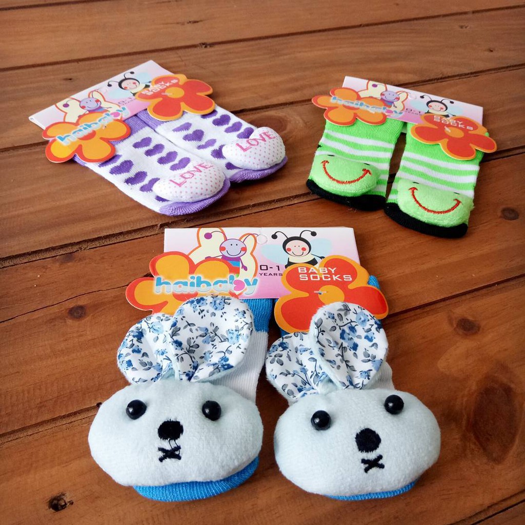 Kaos Kaki Rattle