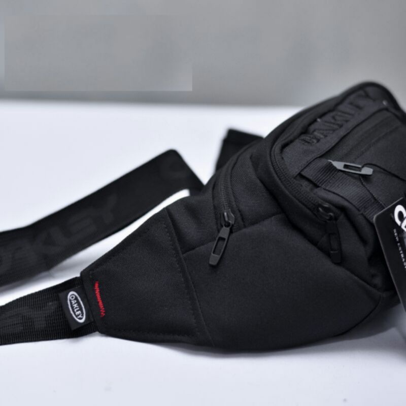 Tas Oakley Slempang Tas Surfing Oakley logo Besi / Tas waistbag distro / Tas Slempang Pria / Waistbag Pria