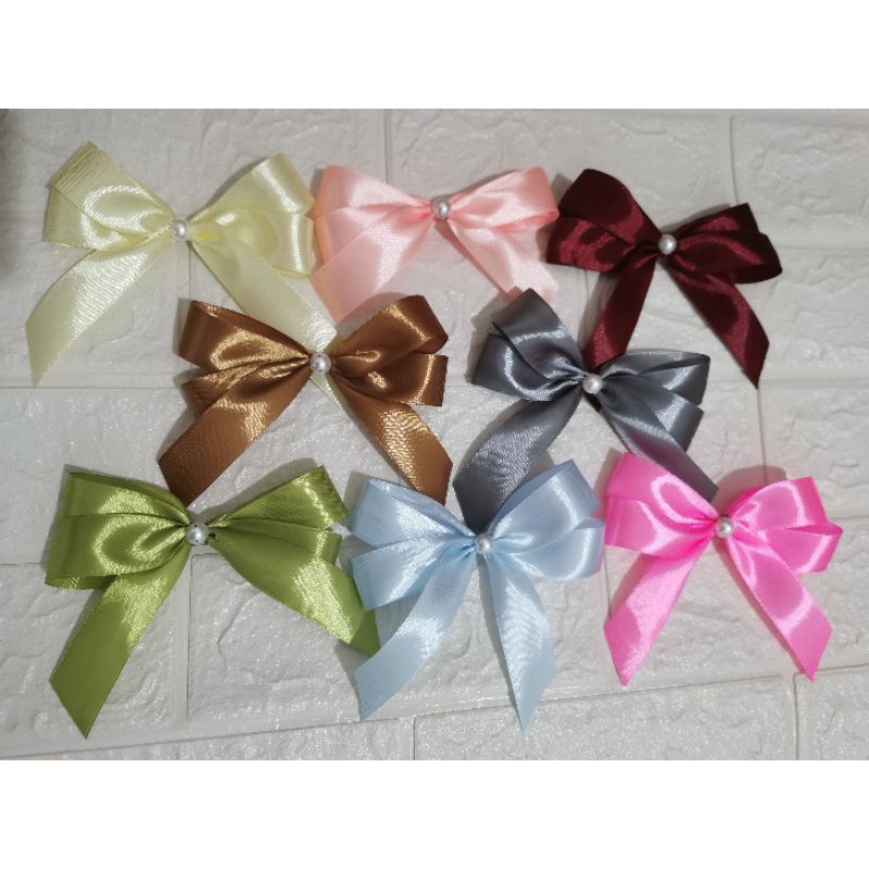

pita satin instan /pita jadi /pita hampers /pita parcel /pita hadiah /pita tambahan /pita besek