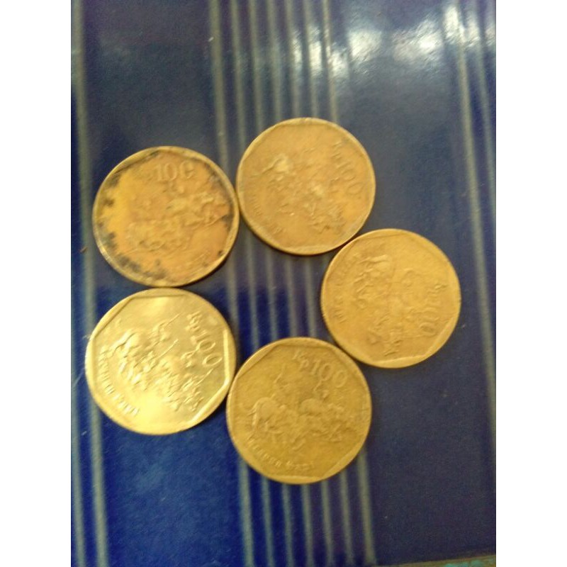 uang koin 100 rupiah karapan sapi