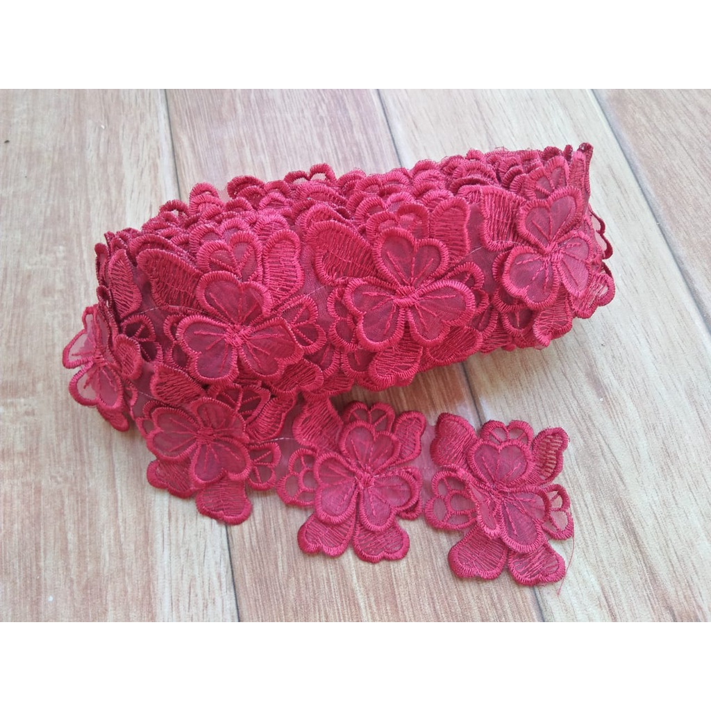 

renda roll motif kupu-kupu