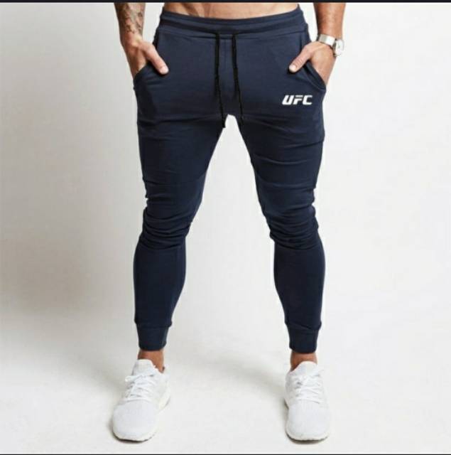 TOTOTAshop.Celana jogger UFC Unisex.bahan fleece premium