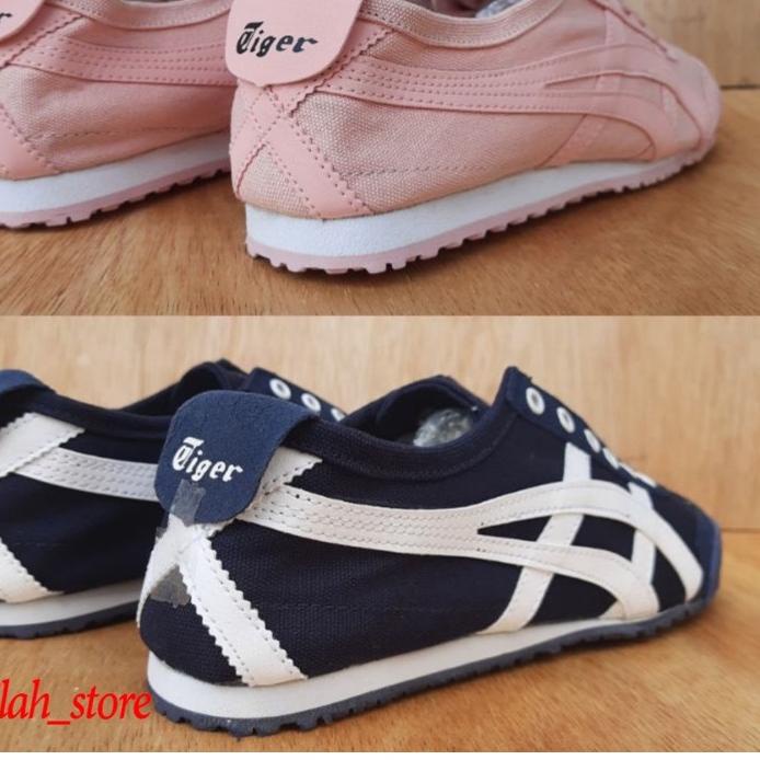 Sepatu Sneakers Slip 0n Tanpa Tali Bahan Kanvas Pria Wanita